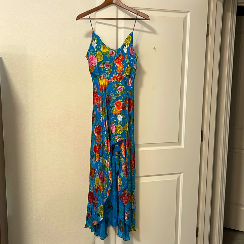Beautiful, colorful, fun and cheeky summer dress. Like new — worn only 2 times.